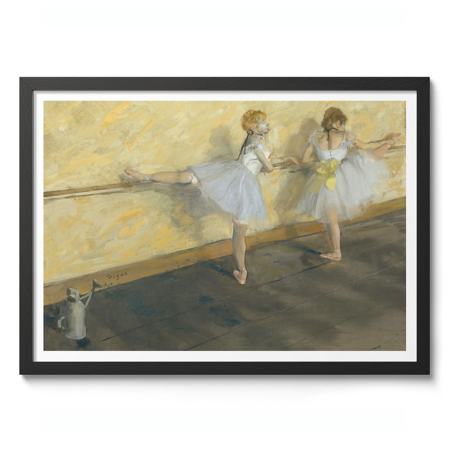 Dansare som övar vid stången