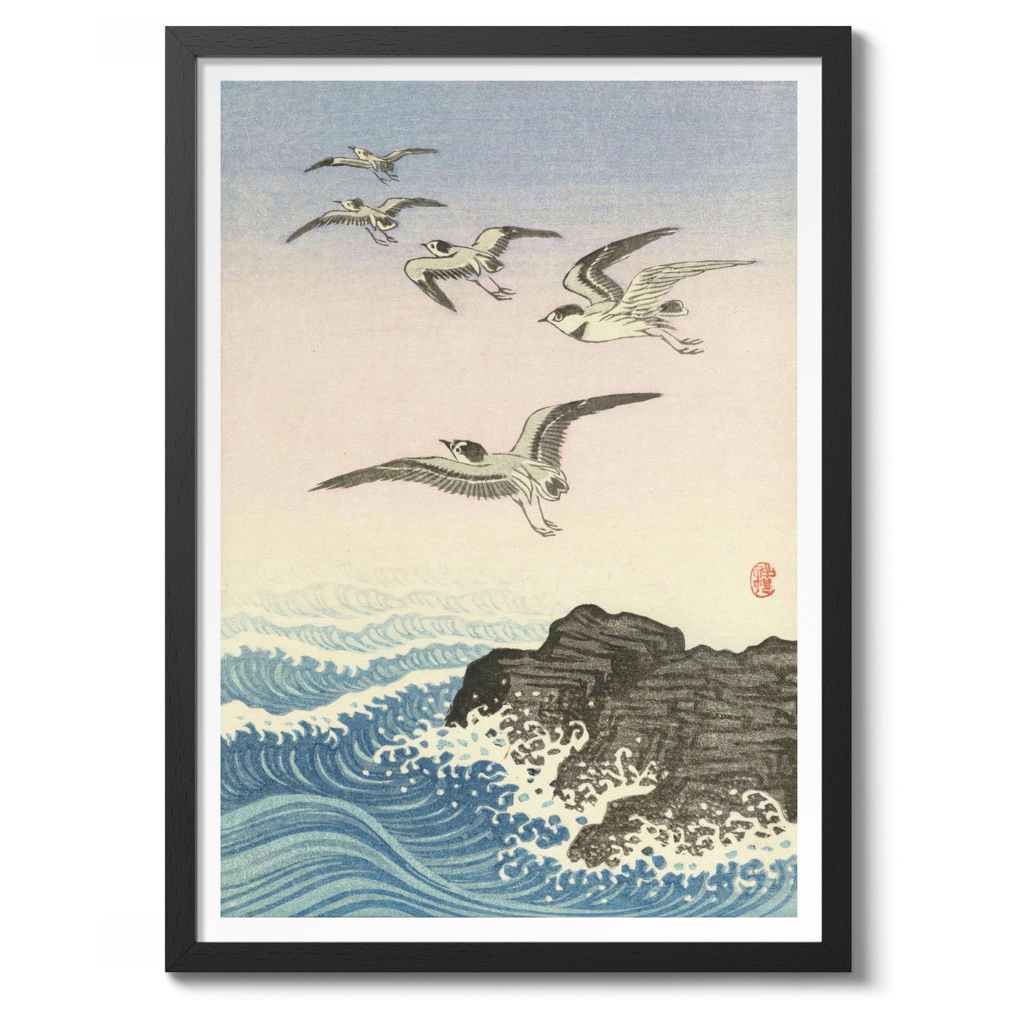 Five Seagulls Above a Rock in the Sea