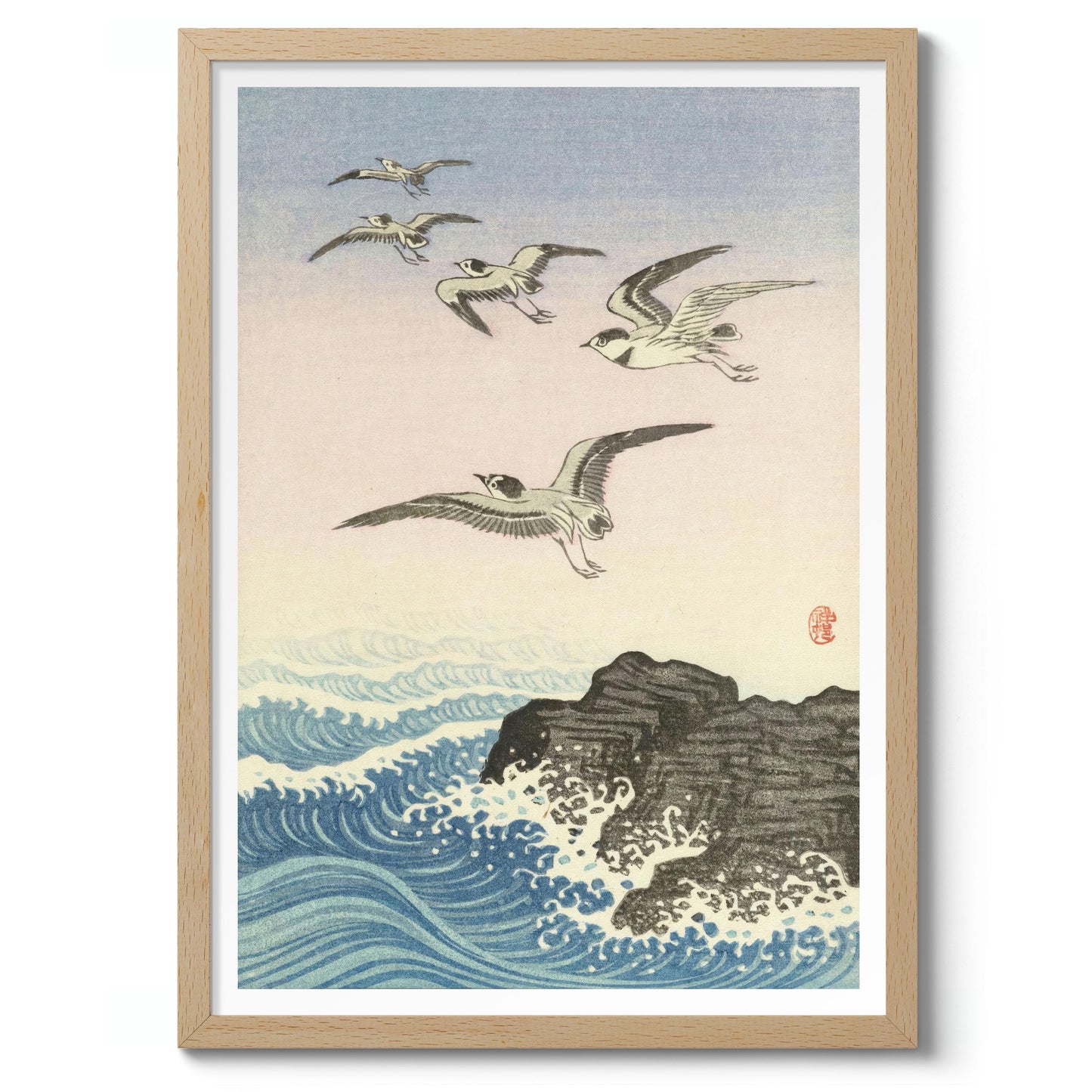Five Seagulls Above a Rock in the Sea